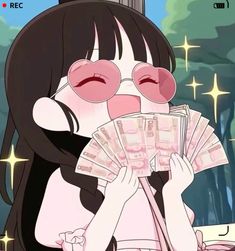 a girl with glasses holding money in her hands