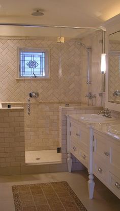 a bathroom with two sinks and a bathtub