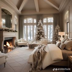 a bedroom decorated for christmas with white furniture and decorations on the fireplace mantels