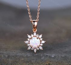 This beautiful Art Deco White Fire Opal Necklace features 1 carat round shaped center stone surrounded by Moissanite/Simulated Diamonds. For those who are looking for agate jewelry which is handcrafted in details, this unique agate necklace would be a perfect choice for you. Whether it be a Birthday gift for her, an anniversary gift her, or a celebration of yourself, this agate jewelry is the perfect gift from the heart. Alexandrite necklace: www.etsy.com/listing/1337968988/1ct-lab-alexandrite-n Alexandrite Necklace, Rutilated Quartz Necklace, October Birthstone Jewelry, Moissanite Pendant, Unique Opal, Fire Opal Necklace, Pretty Jewelry Necklaces, Necklace Rose Gold, Fairy Jewelry