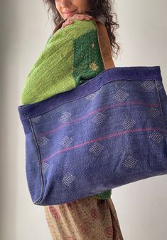 "Beautiful and unique retro vintage style recycled kantha cotton bag with visible stitches  Oryginal look, one of a kind  Comfortable for everyday  School or work  With strong leather belt, soft and light yet thick material  Has pockets inside, and inner cotton lining  closed with zip MEASURE 21\" wide 16\" deep Thank you for looking." Ethically Sourced Tote Shoulder Bag For Everyday Use, Ethically Sourced Rectangular Travel Bag, Rectangular Ethically Sourced Everyday Bag, Bohemian Upcycled Bags For Daily Use, Bohemian Upcycled Tote Shoulder Bag, Bohemian Ethically Sourced Shoulder Bag For Everyday Use, Upcycled Everyday Rectangular Shoulder Bag, Vintage Handmade Canvas Bag For Daily Use, Everyday Upcycled Rectangular Shoulder Bag