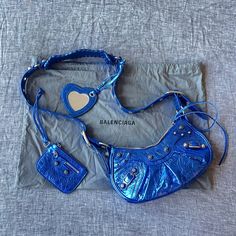 Excellent Condition, Fully Adjustable Straps Can Be Worn Cross Body Or Short On Shoulder. Comes With Dust Bag And I Also Have A Balenciaga Shopping Bag I Can Provide You. Sticker Still On The Mirror, Never Used Designer Blue Shoulder Bag For Shopping, Designer Blue Shoulder Bag With Branded Hardware, Designer Blue Shoulder Bag With Removable Pouch, Balenciaga Shopping Bag, Bags Balenciaga, Balenciaga Bag, Metallic Blue, The Mirror, Christmas List