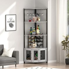 a living room filled with furniture and wine glasses on top of the shelving unit