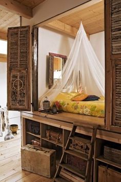 an image of a bed in the middle of a room with a canopy over it