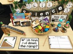 a wooden table topped with lots of toys