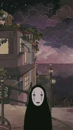 a person with a mask on standing in front of a building and looking at the sky