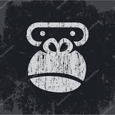 an angry monkey face on a black background with grungy texture stock photo ©