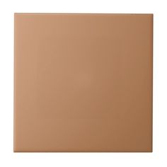 a brown square tile on a white background