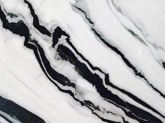 an abstract marble pattern with black and white colors