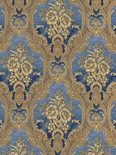 a blue and gold wallpaper with an ornate design