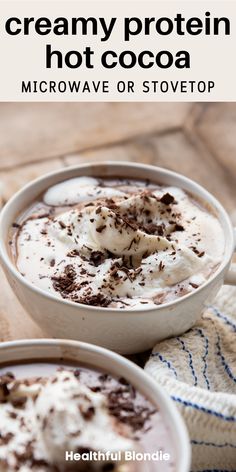 two white bowls filled with creamy protein hot cocoa