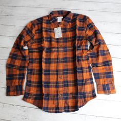 New With Tags Tommy Bahama Button Down Plaid Flannel Shirt 100% Cotton Fall Winter Youth Boy's Size Xxl Xx-Large 16 This Long Sleeve Button Up Flannel Shirt Is Navy Blue, Brown-Ish Orange And Golden Yellow Plaid. It Has A Full Button Up Front. It's A Really Sharp Looking Shirt And Is Brand New With Tags. Orange Relaxed Fit Cotton Shirt, Classic Orange Tops For Fall, Classic Orange Top For Fall, Collared Orange Shirt With Buttons, Orange Collared Shirt With Buttons, Classic Orange Buttoned Top, Classic Orange Tops With Buttons, Classic Orange Cotton Tops, Casual Orange Cotton Shirt