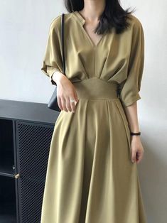 Solid Color V-neck Dress For Semi-formal Occasions, Semi-formal Solid V-neck Dress, Solid V-neck Dress For Semi-formal Occasions, Classic V-neck Dress With Pleated Waist, Classic Pleated V-neck Midi Dress, Semi-formal Beige V-neck Dress, Beige V-neck Semi-formal Dress, Elegant Plain V-neck Dress, Elegant Plain Midi Dress For Work