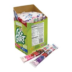 an open box of gourmet toothpaste on a white background