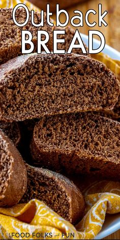 a close up of bread on a plate with the words outback bread above it