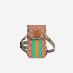 Introducing the Gucci Web Flap Phone Holder Crossbody Bag, a vibrant and practical accessory designed to elevate your everyday style. Crafted from multicolor GG coated canvas, this bag is adorned with the iconic Gucci Web stripe detail, adding a touch of luxury and sophistication. Perfect for the modern individual on the go, this phone holder crossbody bag seamlessly combines fashion and functionality. Its compact size makes it ideal for carrying your essentials, including your phone, cards, and keys, while keeping your hands free for other activities. SPL Exterior Mixed Multicolour GG Canvas Tan smooth calfskin leather trims Gold-tone hardware Red/Green stripes print Magnetic closure Adjustable crossbody strap Unused Interior Tan lambskin lining Slip Gucci embossed leather logo tag Unused Phone Cards, Logo Tag, Dior Shoes, Timeless Handbag, Leather Logo, Chic Me, Luxe Fashion, Exclusive Bag, Chanel Handbags