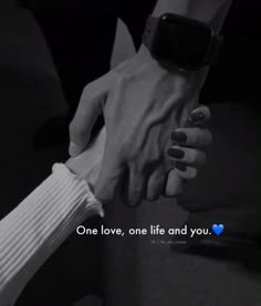 two people holding hands with the words one love, one life and you