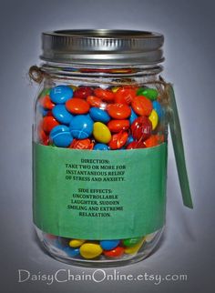 a jar filled with lots of colorful candy