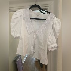 Shop s134642's closet or find the perfect look from millions of stylists. Fast shipping and buyer protection. NWOT, button through blouse with sparkly buttons, lace detail trim and collar, and cute puff sleeves! UK 10 US 6 Bought from ASOS NORDSTROM, Zara, h&m