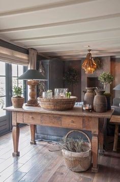 a table with baskets on top of it in a room