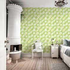 a bedroom with green wallpaper and white furniture