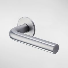 a close up of a door handle on a white background