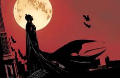 the silhouette of a batman standing in front of a full moon with bats flying around