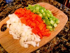 chopped vegetables on a cutting board ready to be cooked