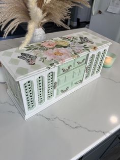 a decorative box sitting on top of a counter