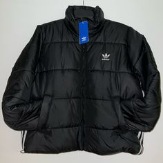 Adidas Adicolor Puffer Women’s Jacket Black White 23 Inches Front Zipper 2 Side Zipper Pockets 22 Inches Across Chest 100% Polyester Style Ii8455 100% Authentic New With Tags. Adidas Winter Jacket, Adidas Puffer Jacket, Adidas Originals Jacket, Adidas Adicolor, Adidas Windbreaker, Adidas Originals Women, Hooded Vest, Puffy Jacket, Winter Jackets Women