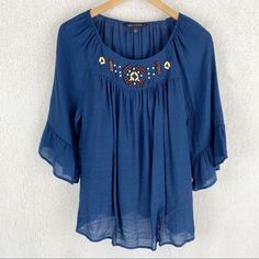 Zac & Rachel Sheer Boho Blue Embellished Peasant Top Peasant Style Top Embellished With 2 Tone Wooden Beads Ruffled 3/4 Sleeves Crepe' Type Fabric With Natural Crinkle Texture 65% Polyester, 35% Rayon Color: Deep Pacific (Navy Blue) Size: Medium Length: 28" Pit To Pit: 20" Condition: New Without Tags - Excellent Condition & Smoke-Free Home Boho Blue, Peasant Style, Peasant Top, Peasant Tops, Chiffon Tops, Chiffon Dress, Wooden Beads, Medium Length, Top Styles