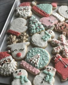 decorated christmas cookies on a baking sheet