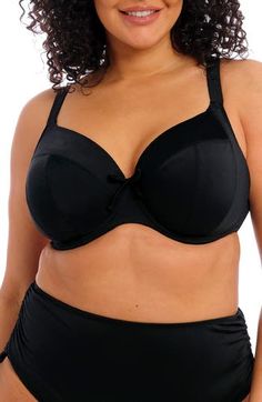 This bikini top is designed with three-section underwire cups for undeniable comfort and support while you hang out poolside. An internal powernet lining helps with forward bust projection. Lined 84% nylon, 16% elastane Hand wash, line dry Imported Underwire Swimwear With Removable Cups, Full Coverage Black Swimwear With Removable Bra Pads, Black Padded Underwire Swimwear, Black Underwire Swimwear, Bra Friendly, Black Underwire Swimwear Bra Friendly, Black Underwire Bra-friendly Swimwear, Black Push-up Swimwear With Adjustable Straps, Black Push-up Swimwear For Swimming, Full Coverage Padded Swimwear For Pool