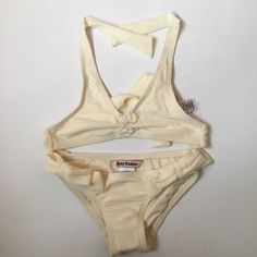 Super Cute Ivory Juicy Couture Bikini -This Swim Suit Was Never Used But Has No Tags, Its In Perfect Condition -Size 2 -Little Flower Details On The Top And Bottom Add To A Bundle And Save $$$ Juicy Couture Swimsuit, Theodore Nott, Swim Suits, Kids Swimming, Swim Suit, Juicy Couture, Bathing Suit, Tankini, Bathing Suits