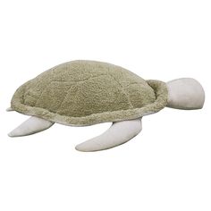 a stuffed turtle that is laying down