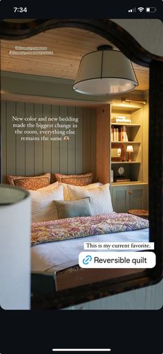 an image of a bedroom with a quote on the wall and bed in the background