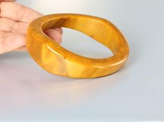 Hey, I found this really awesome Etsy listing at https://www.etsy.com/listing/600383259/thick-bakelite-bangle-butterscotch Bangle Design, Bakelite Bracelets, 1960s Jewelry, Bakelite Jewelry, Spartanburg Sc, Bakelite Bangles, Modernist Jewelry, Vintage Bangles, Cat Brooch