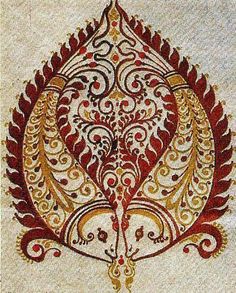 an intricately designed piece of cloth with red and gold designs on it's side