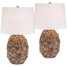 two lamps that are made out of straw