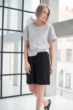 "Comfort in a stylish way is guaranteed wearing these basic linen shorts. A perfect choice for a hot summer, active days, and every moment you wish efortless, feminine look. DETAILS - Side seam pockets - Wide, comfortable elastic waistband - Mid-length to fall above the knee - 100% midweight (185 g/m2) European softened (washed) linen fabric - Oeko Tex certified linen - Cut and sewn to order just for you in our studio - Various colors - Color shown in the photo is black - We can add a free Color Relaxed Linen Shorts For Summer, Relaxed Solid Color Summer Shorts, Relaxed Solid Shorts For Summer, Summer Linen Short Tops, Summer Linen Tops With Short Shape, Relaxed Summer Shorts, Casual Linen Shorts For Spring, Summer Tops With Built-in Shorts And Relaxed Fit, Short Linen Top For Beach