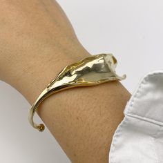 Add dazzling shine to your ensemble with this LILY Leaf Cuff Bracelet. It will match every ensemble you have. This fashion-forward bracelet is lightweight and durable. It is crafted from high-quality material and boasts a leaf design with hand-cast open cuff detailing, ideal for adding a dose of unexpected elegance to everyday ensembles. Wear it on those special occasions or save it for the more relaxed days when you still want a pop of color. Features: Lightweight feel Super elegant Very comfor Jewelry Bracelets Gold, Hand Cast, Polished Brass, Leaf Design, Sterling Silver Bracelets, Cuff Bracelet, Gold Jewelry, Fashion Forward, Color Pop