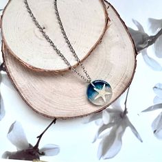 Ocean Starfish Necklace Is Handcrafted Materials: Silver Chain, Resin, Sand, Real Starfish & Beads. Chain Length Is Approx 20" With 2" Extension And Lobster Claw Clasps The Image May Show A Slight Color Differences Bundle Any 2 Items And Get 15% Off! Boutique Items Are Non-Negotiable Because They’re All Handmade With Love. Ocean-inspired Blue Shell Necklace Gift, Ocean-inspired Necklaces With Charms For Beach, Ocean-inspired Beach Necklaces With Charms, Blue Shell-shaped Ocean-inspired Necklace, Resin Sand, Summer Ocean-inspired Necklace With Starfish Charm, Ocean Starfish, Dainty Pendant Necklace, Double Heart Necklace