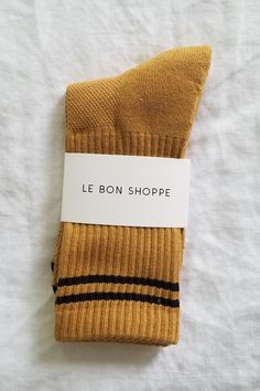 Le Bon Shoppe Boyfriend socks. Stay fly all year long in these calf length sports socks. Pair with sneakers or sliders. Perfect for work from home. One size fits most. 85% cotton, 13% polyester, 2% spandex. Fair trade made in Korea. PIPE AND ROW Casual Yellow Socks For Stocking Stuffers, Sporty Yellow Cotton Socks, Boyfriend Socks, Comfy Socks, Summer 22, Sports Socks, Sport Socks, Individual Style, Work From Home