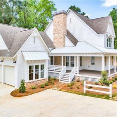 a large white house with lots of windows