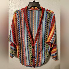 Never Worn - Rainbow - Boho Hippy Retro Weave Zigzag Striped Button Up Cardigan - Rainbow - Half Sleeve Multicolor V-neck Cardigan One Size, Multicolor Retro Cardigan With Buttons, Retro Multicolor Cardigan With Buttons, Multicolor Button-up Sweater, Multicolor Button-up Sweater With Buttons, Retro Multicolor Buttoned Cardigan, Multicolor Knit Cardigan With Button Closure, Multicolor Knit Sweater With Buttons, Multicolor Button-up Cardigan For Fall