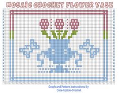 a cross stitch pattern with flowers in a vase