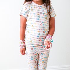 These short sleeve pjs are soft, breathable and super comfy! Made with super soft Bamboo these matching pant and top sets will keep your little one super cozy and snuggly. Short sleeve pajamas for all year lounging. Our pajamas comply with the snug fitting standards for apparel not treated with flame retardants and should be worn snug fitted. 93% Bamboo; 7% Spandex Set includes short sleeve top and pajama pants Wash cold with like colors and fabrics; stays soft wash after wash Tumble dry low or Playful Multicolor Sleepwear For Loungewear, Cute Multicolor Sleepwear For Loungewear, Multicolor Short Sleeve Sleepwear In Relaxed Fit, Multicolor Short Sleeve Sleepwear With Relaxed Fit, Multicolor Relaxed Fit Sleepwear With Short Sleeves, Multicolor Relaxed Fit Short Sleeve Sleepwear, Multicolor Short Sleeve Casual Sleepwear, Casual Multicolor Short Sleeve Sleepwear, Playful Relaxed Fit Pajama Party Sets