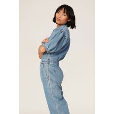 Blue denim (100% Cotton). Jumpsuits. Collared. Short sleeve. Front button closure. Imported. Dark Wash Short Sleeve Denim Jumpsuit For Fall, Denim Jumpsuits And Rompers With Short Sleeves For Fall, Medium Wash Denim Jumpsuit For Work, Workwear Medium Wash Denim Jumpsuit, Light Wash Long Sleeve Denim Jumpsuit, Long Sleeve Relaxed Fit Denim Jumpsuit With Button Closure, Fall Button-up Medium Wash Denim Jumpsuit, Spring Light Wash Denim Jumpsuit For Work, Relaxed Fit Button-up Denim Jumpsuit For Fall