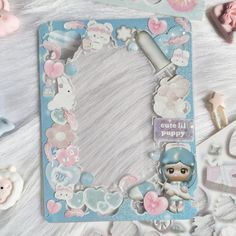 a baby's photo frame with teddy bears and other items