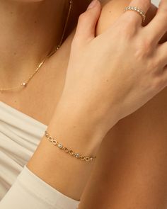 Get our Endless Love Infinity Bracelet to express your eternal love. It features a delicate chain and a charming infinity symbol, perfect for gifting on special occasions like birthdays and anniversaries.Materials: 14K Yellow Gold or Rhodium plated. AAAAA Cubic Zirconia. Measurements: Length: 6" + 2.5" extender; Chain Width: 1.2mm; Charms Width: 3.8mm; Infinity Charm: 10mm x 3.8mm. Hypoallergenic; nickel, lead, and cadmium free. Gold Cubic Zirconia Infinity Bracelet, Elegant Adjustable Chain Bracelet For Mother's Day, Minimalist Gold Bracelet With Adjustable Chain For Anniversary, Minimalist Gold Plated Chain Bracelet For Anniversary, Tarnish Resistant Infinity Jewelry As Gift, Minimalist Adjustable Chain Bracelet For Anniversary, Elegant Everyday Bracelets For Mother's Day, Elegant Everyday Bracelet For Mother's Day, Dainty Infinity Bracelets With Adjustable Chain